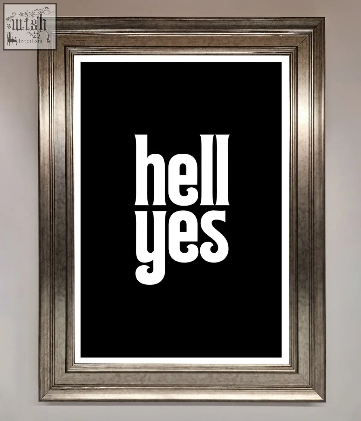 Silver-framed print with bold white hell yes text on black background offering stylish frame choices