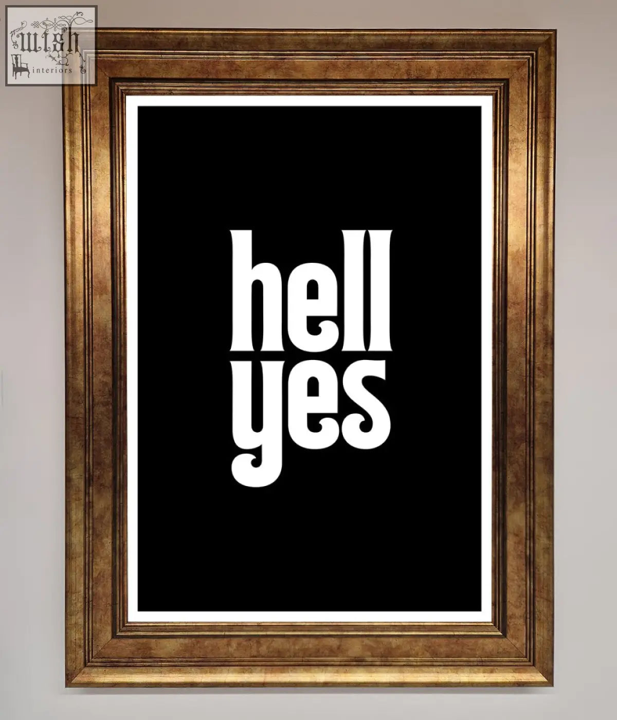A framed print featuring bold white hell yes text in a classic serif font with ornate gold frame choices