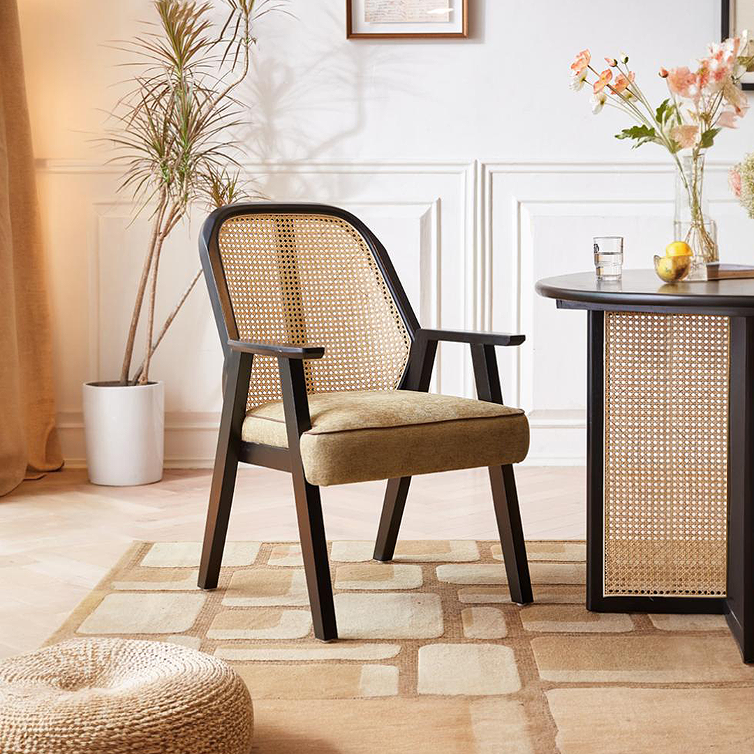 Dark wood framed hellen rattan dining chair with woven cane back and cotton linen olive seat upholstery