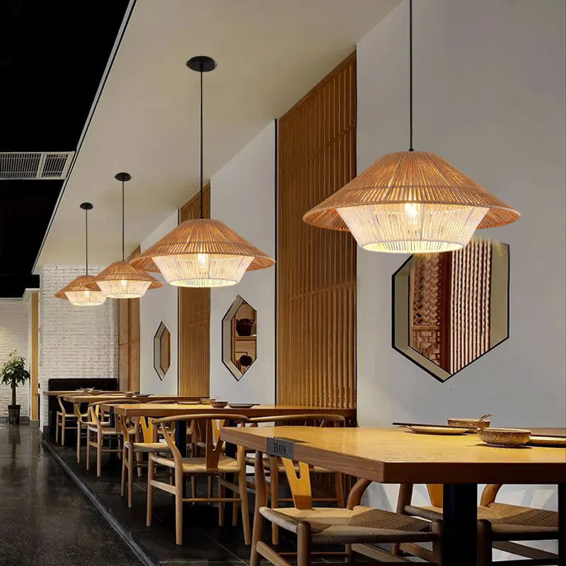 Hempo Light woven bamboo pendant light with warm diffused glow and natural tan color perfect for cozy spaces