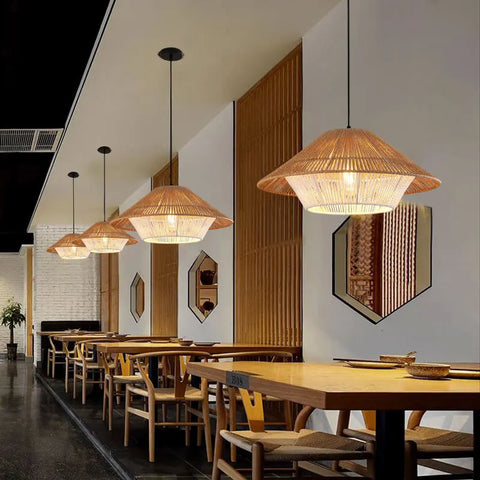 Hempo Light woven bamboo pendant light with warm diffused glow and natural tan color perfect for cozy spaces