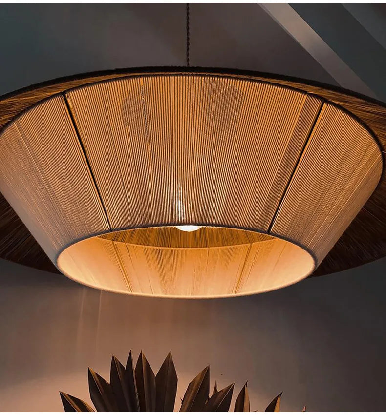 Hempo Light warm-toned circular pendant light with woven bamboo shade and dark wooden rim for cozy lighting
