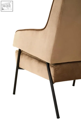Beige henia mink velvet chair with sleek black metal legs a soft and stylish mink velvet armchair