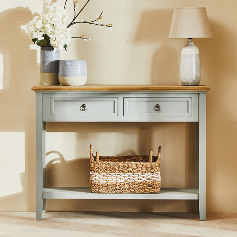 Henley antique grey console table with light gray paint, natural wood top, and two drawers with black metal ring pulls