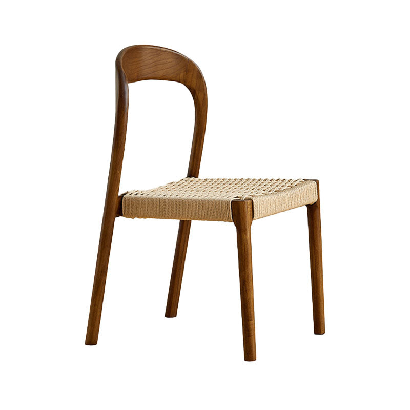 Henry dining chair with a minimalist wooden frame and woven rattan seat perfect for cozy dining spaces minimum purchase qty applies