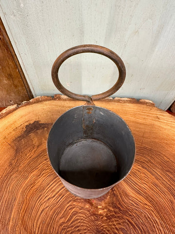 Rustic metal herb plant pot planter with circular handle and dark weathered finish for desk tidy or cutlery holder