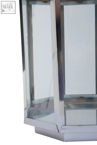 Herber large silver steel lantern with chrome finish clear glass panels and hexagonal base for outdoor use