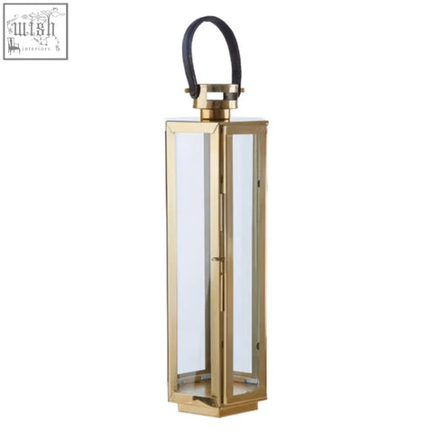 Herber medium gold finish lantern with clear glass panels and black leather handle for stylish lighting