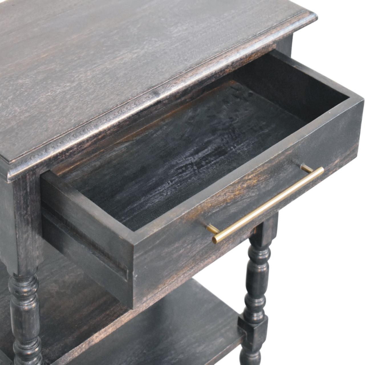 Dark gray distressed solid mango wood end table with turned legs and single smooth-glide drawer in carbon ash finish