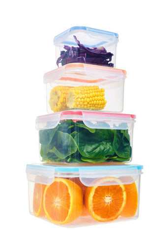 Stack of herrela 4pc square food containers with airtight colorful silicone lids holding fresh produce