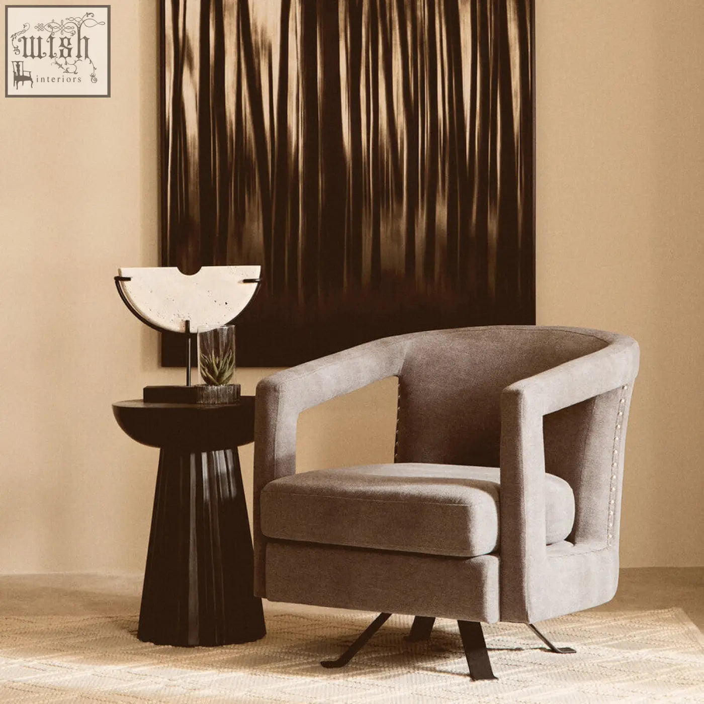 Gray hestia ash velvet swivel chair with studded detailing and a modern curved design in ash velvet upholstery