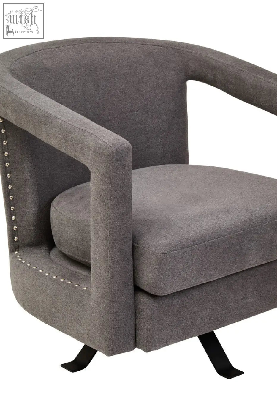 Gray upholstered hestia ash velvet swivel chair with studded detailing and black metal legs for stylish seating