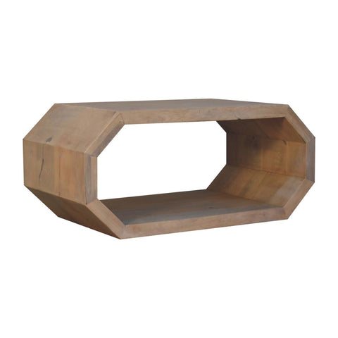Light brown wooden hexagonal coffee table with visible wood grain and hollow center for modern living spaces