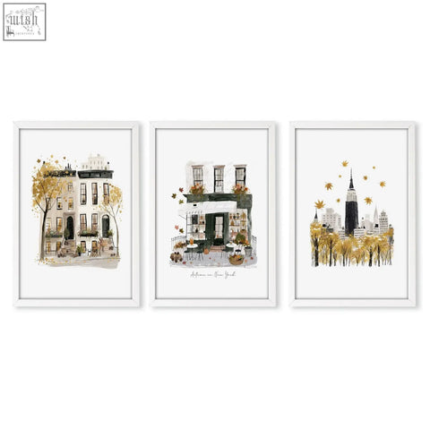 Set of three white-framed watercolor travel wall art prints showing ochre autumn scenes in new york city