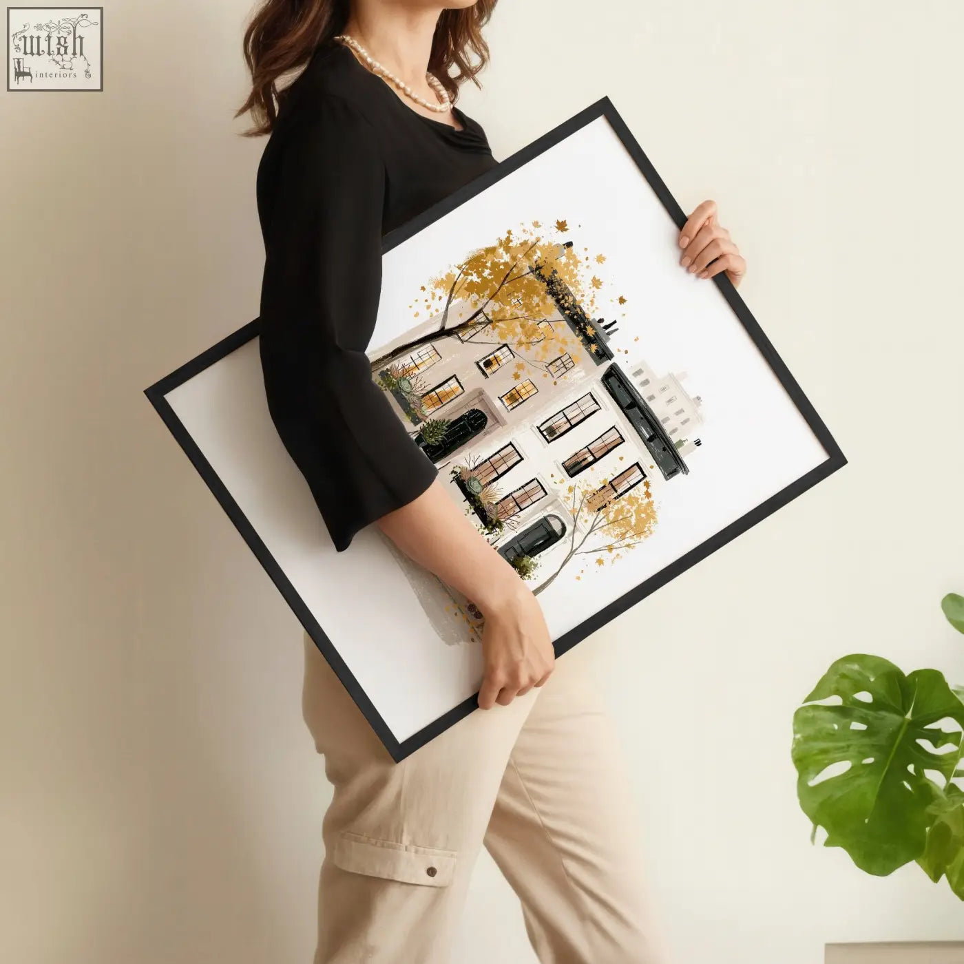 Black-framed travel wall art with watercolor building illustration and golden autumn leaves from hgfluflu new york set