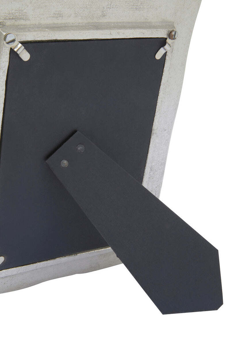 White distressed 5in x 7in photo frame with silver finish bamboo effect and black backing secured by metal clips