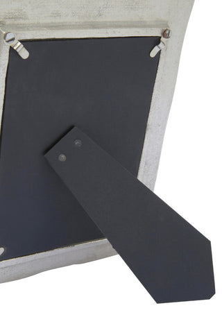 White distressed 5in x 7in photo frame with silver finish bamboo effect and black backing secured by metal clips