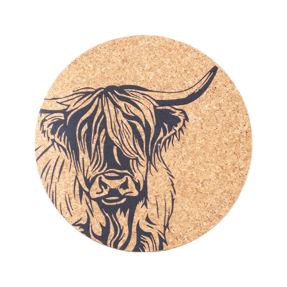 Circular portuguese cork place mat featuring a black ink illustration of a highland cow face for table use