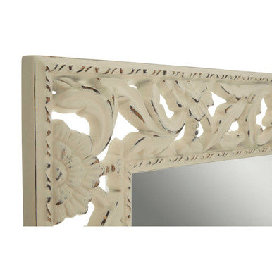 Cream-colored carved wooden mirror frame with intricate floral patterns in antique white baroque style wall mirror