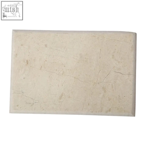 Cream-colored himaya champagne marble rectangular chopping and serving board with subtle natural stone texture