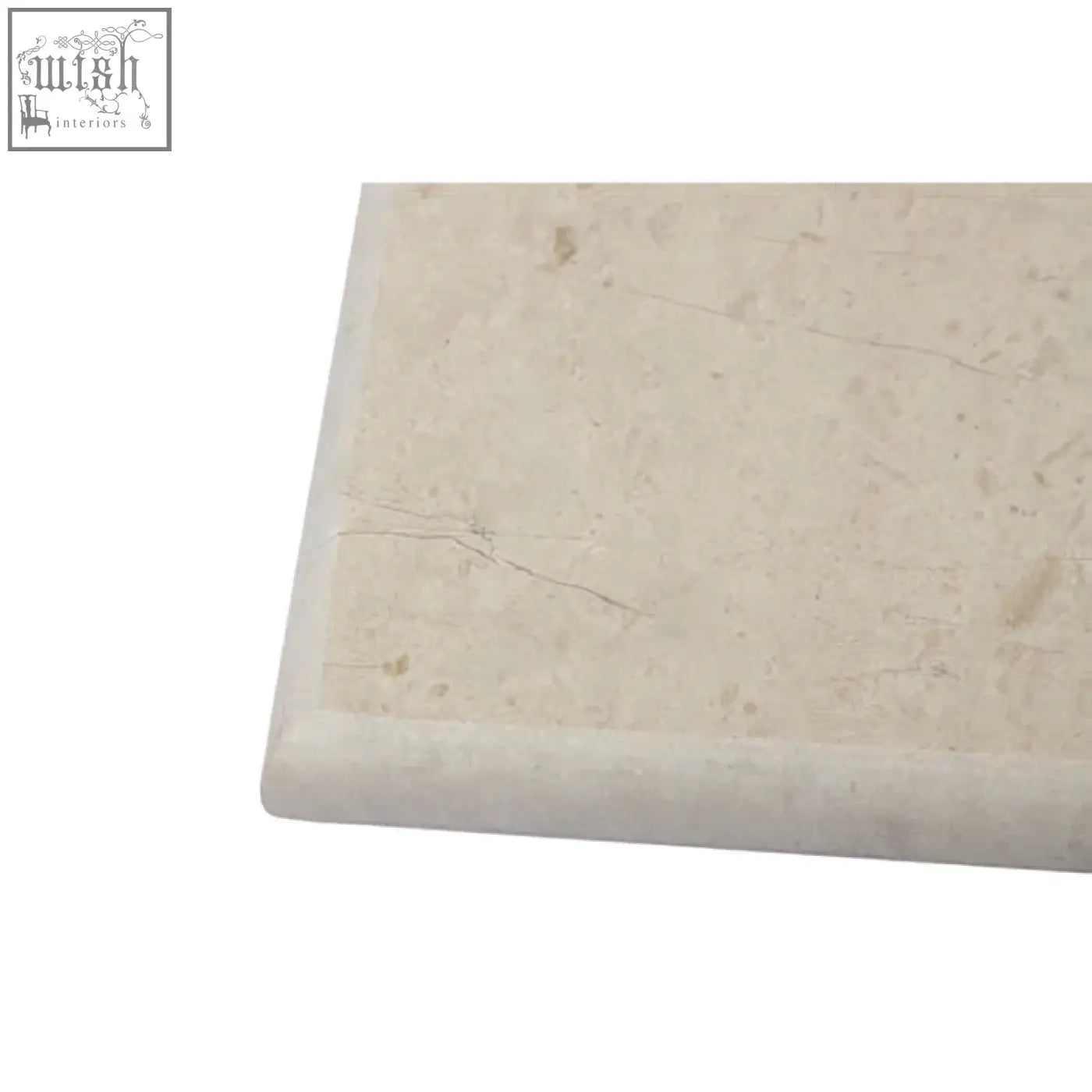 Cream-colored himaya champagne marble rectangular chopping board with subtle veining and smooth beveled edge