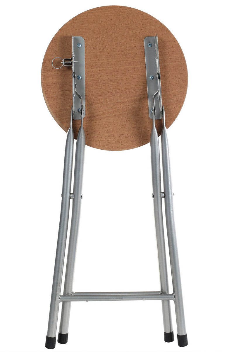 Hinata folding stool with a round wood veneer seat on a silver metal folding frame and black rubber feet