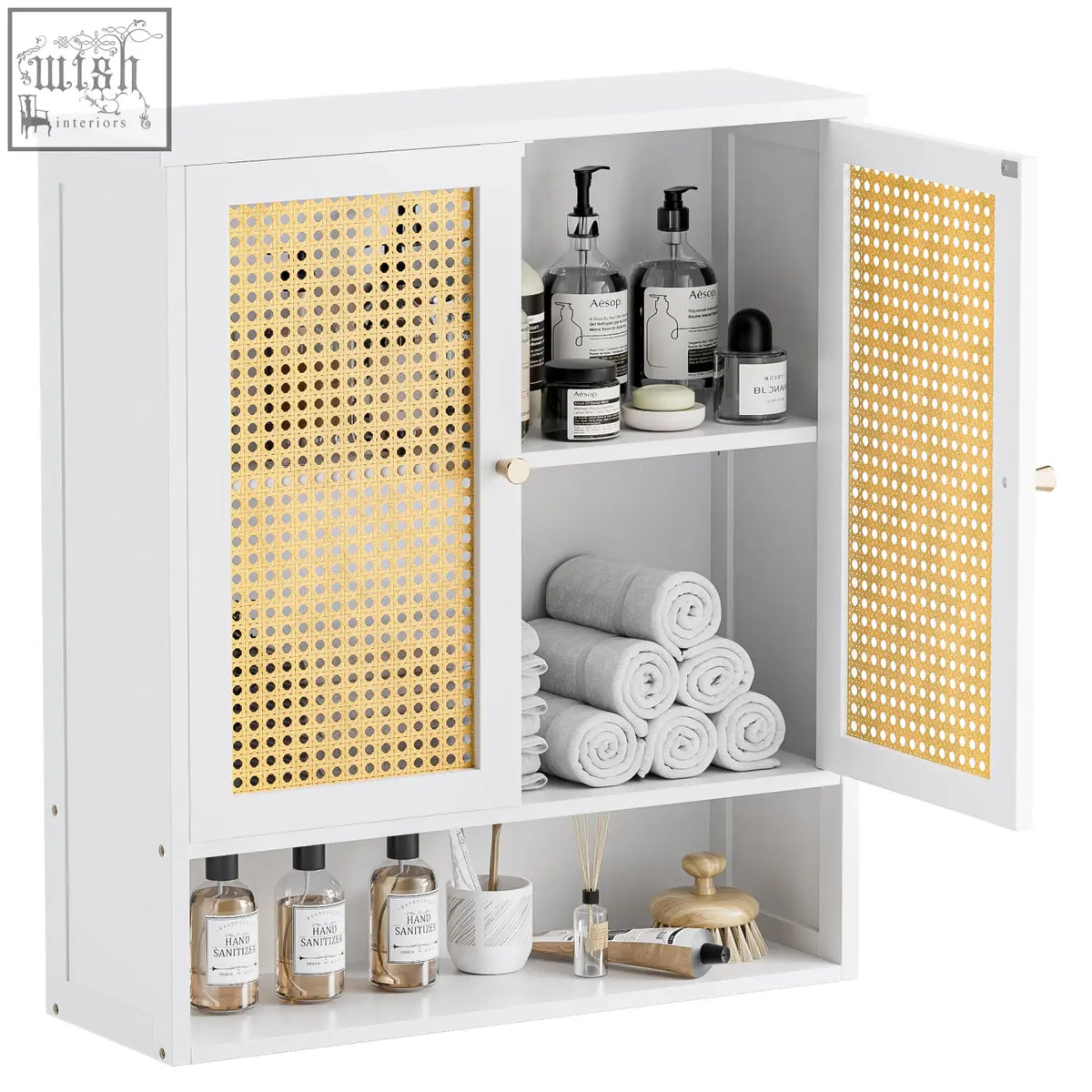White bamboo bathroom wall cabinet with gold cane panel doors and open shelf holding toiletries for space saver storage