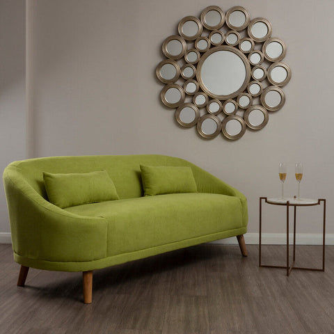 A vibrant holland green linen sofa with lime green velvet upholstery wooden legs and two matching cushions