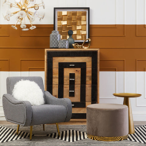 Holli black and white checked armchair with houndstooth pattern, white faux fur pillow, and gold finish legs