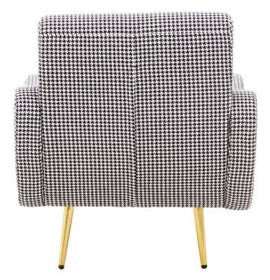 Holli black and white checked armchair with a classic houndstooth pattern and slender gold finish legs