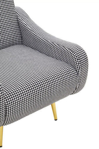 Holli black and white checked armchair with classic houndstooth pattern and stylish gold finish legs for any room