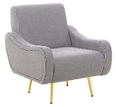 Holli black and white checked armchair with a bold houndstooth pattern and slender gold finish legs