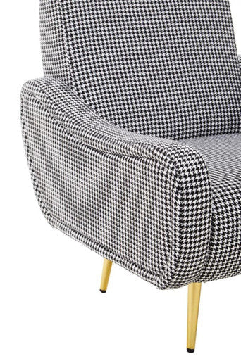 A holli black and white checked armchair with classic houndstooth fabric and gold finish legs