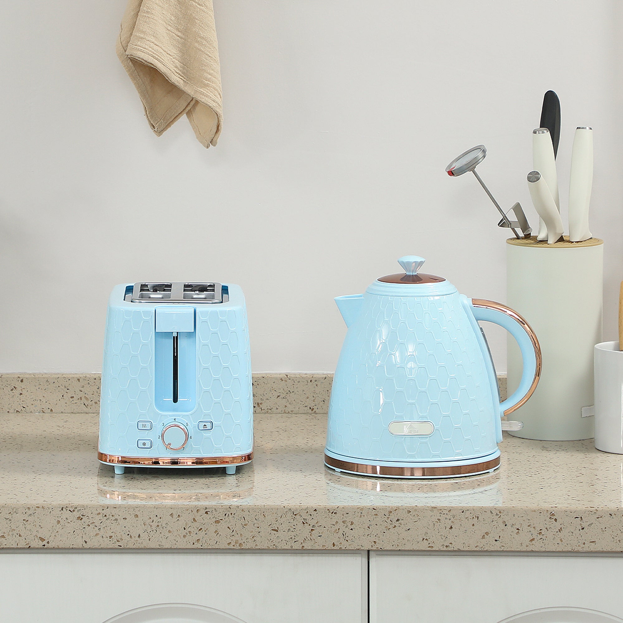 Light blue homcom fast boil kettle with rose gold accents and honeycomb texture for quick boiling and two slice toaster set