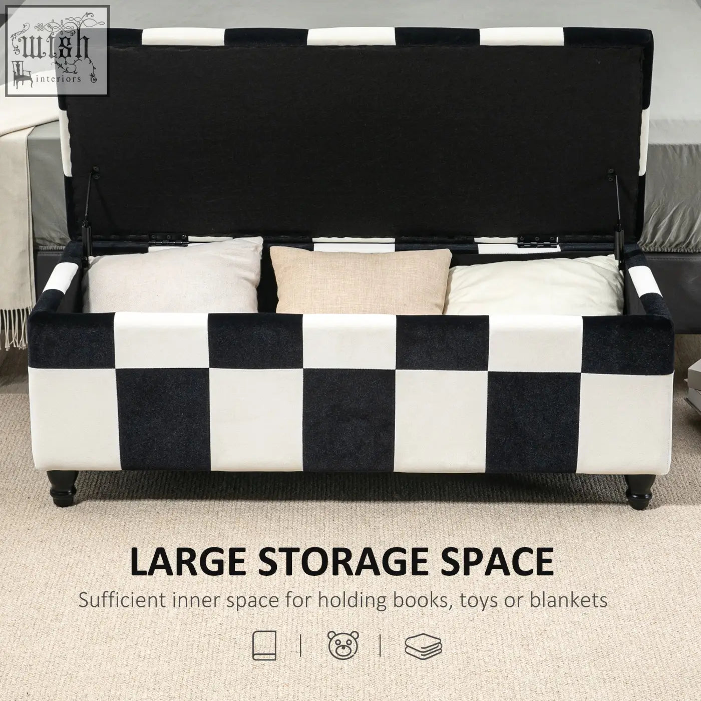 Black and white colour block storage ottoman with plush velvet finish and wooden legs for bedroom or living room storage