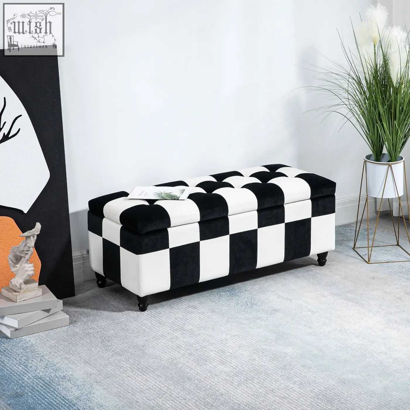 Black and white colour block velvet storage ottoman with tufted top and wooden legs for living room or bedroom use