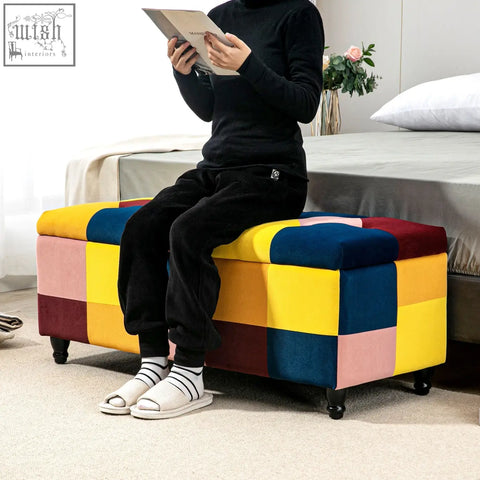 Multicolored colour block velvet storage ottoman with button-tufted lid and black casters for living room or bedroom