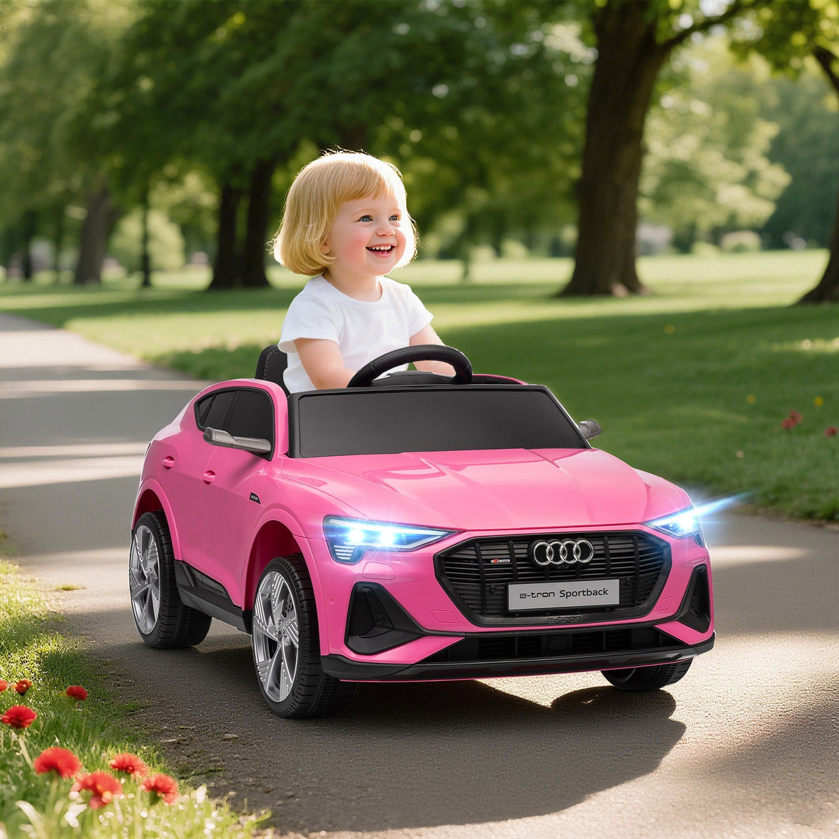 Pink audi e-tron sportback kids electric ride on car with remote control lights suspension and card slot features
