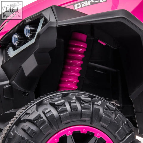 Pink and black homcom 12v ride kids off-road quad bike with led headlights textured tyres and a pink coil spring