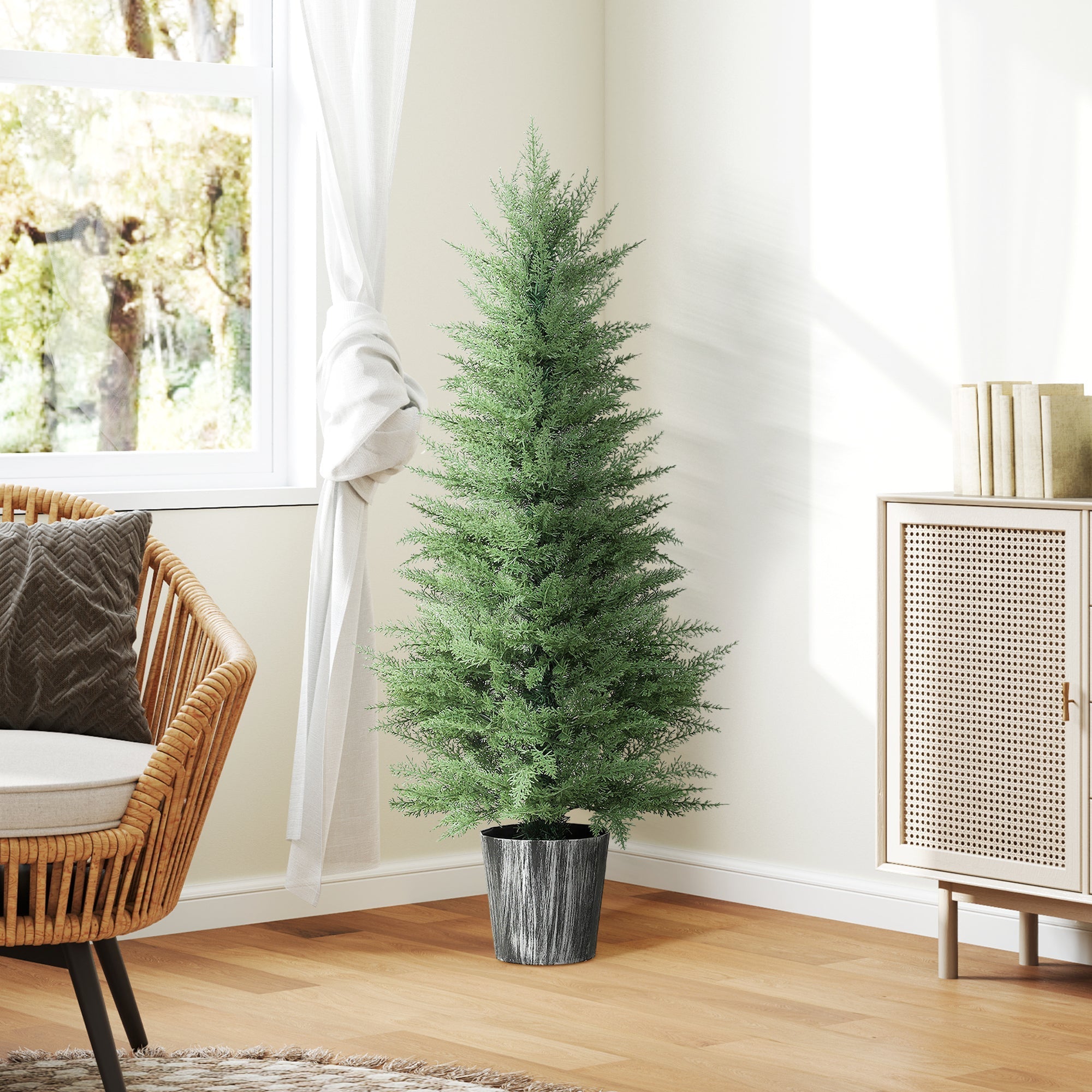 A tall artificial cypress tree with dense green foliage in a textured gray pot perfect for indoor outdoor decor