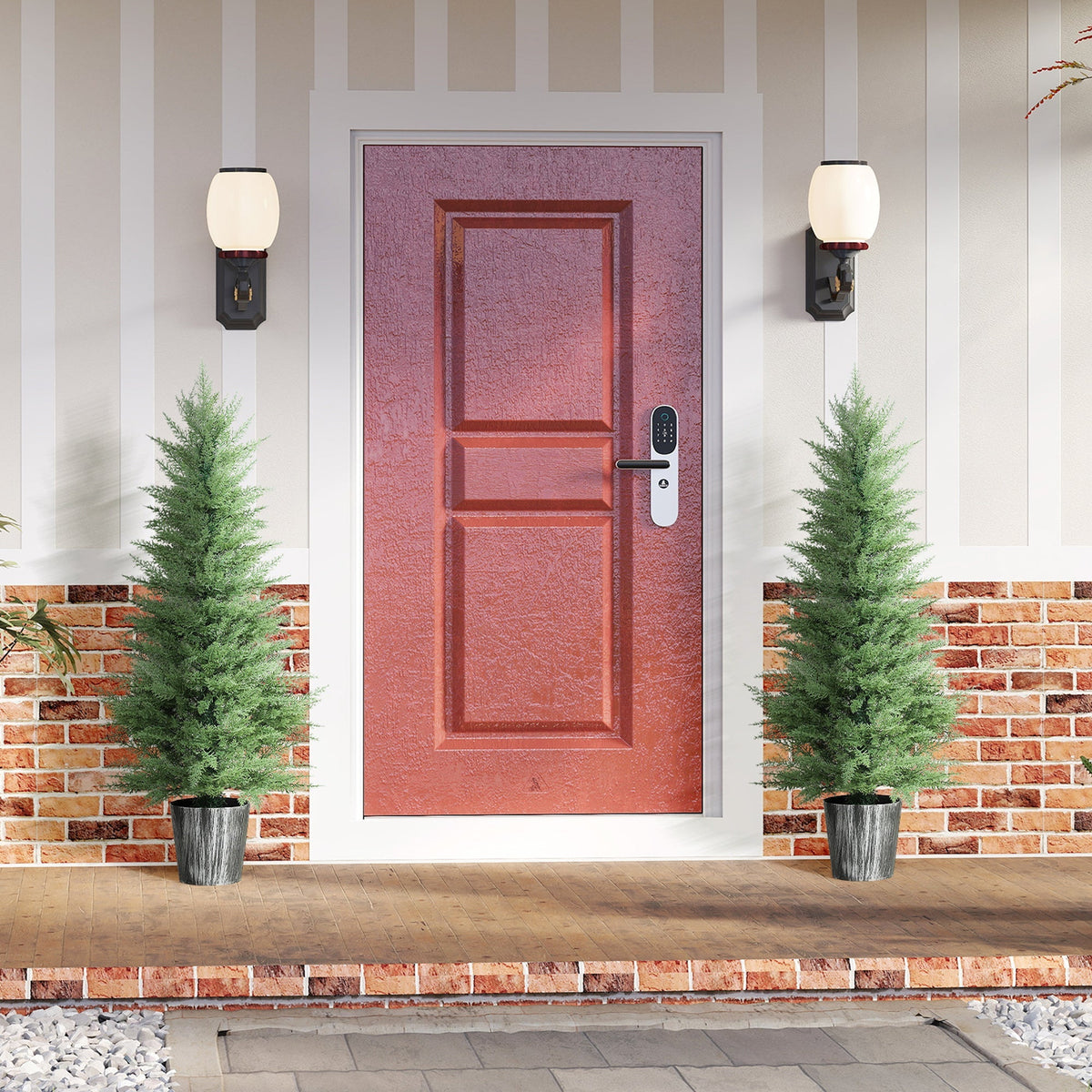 A reddish-brown front door with white trim next to green artificial cypress trees set in decorative pots for indoor outdoor decor