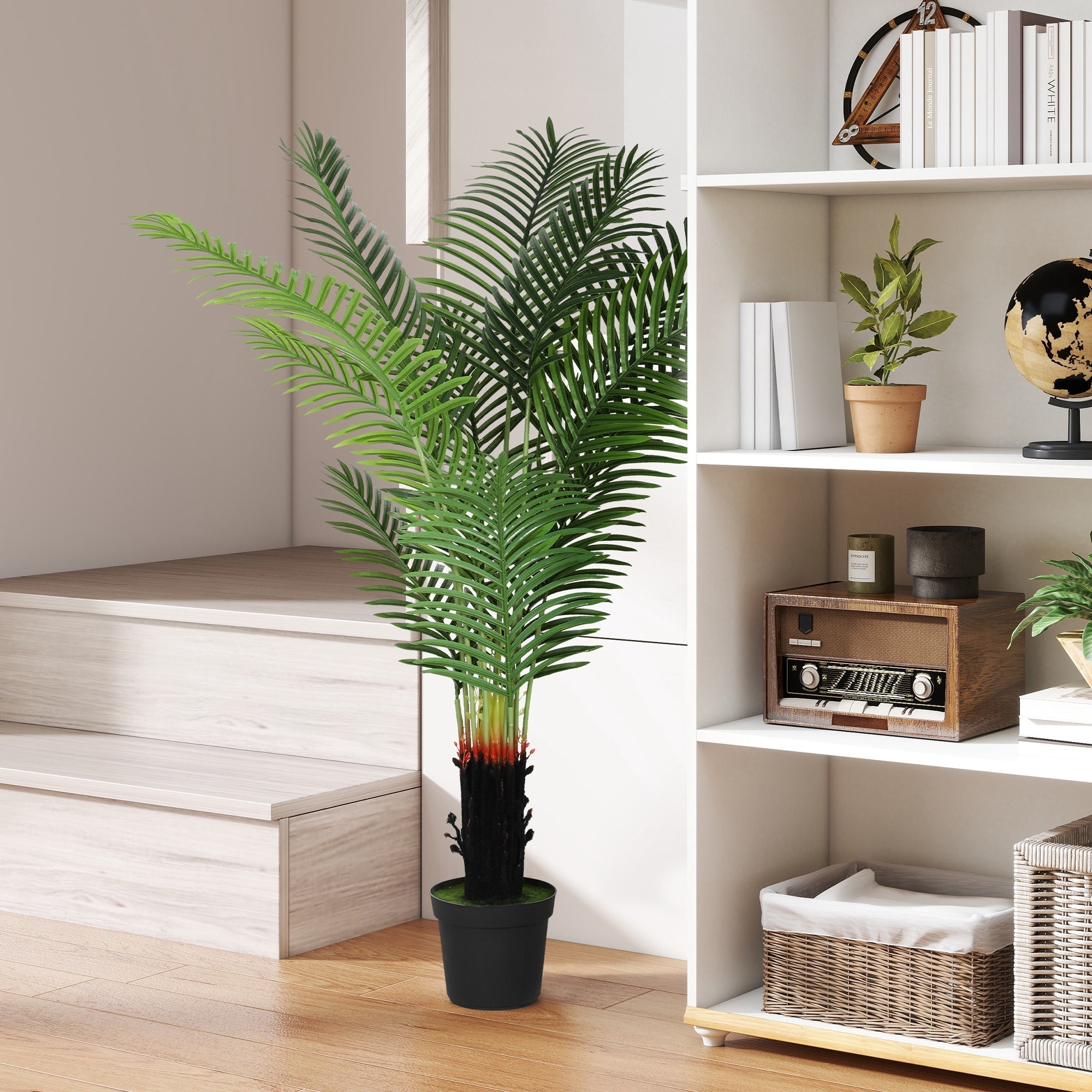 Tall artificial areca palm tree with lush green pe leaves and black pot featuring red orange gradient trunk accents