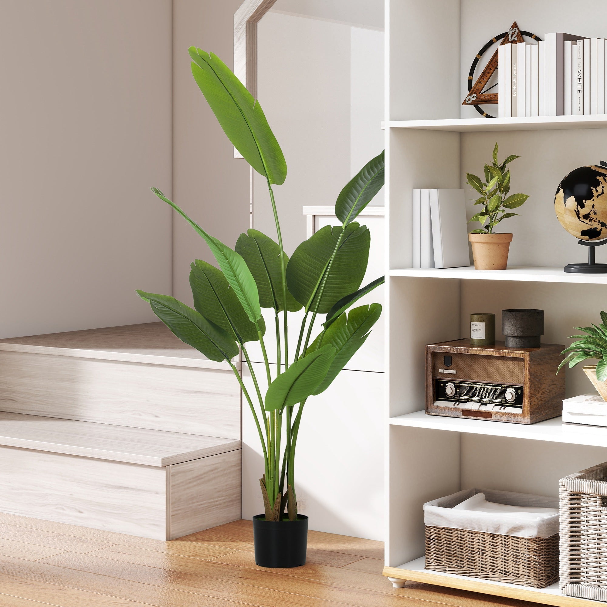 Tall green artificial bird of paradise plant with peva leaves and flocked soil in black pot for home decor