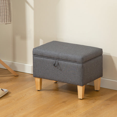 Gray textured fabric storage ottoman with light rubberwood legs in charcoal grey for bed end seating and storage