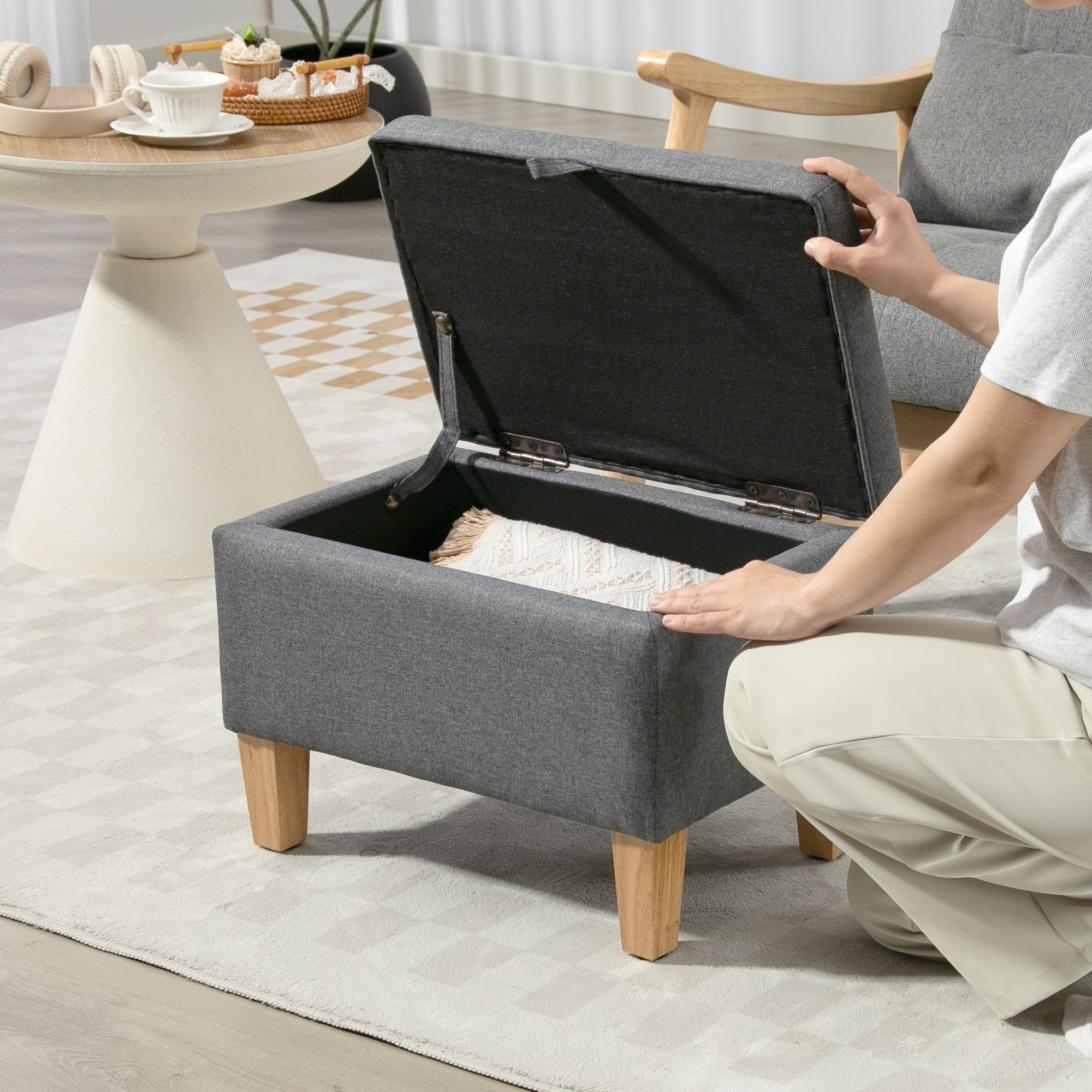 Charcoal grey linen storage ottoman with padded top and rubberwood legs perfect for bed end seating and storage