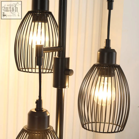 Black wrought iron cage-style industrial floor lamp with 3 dimmable lights max 40w for living room use