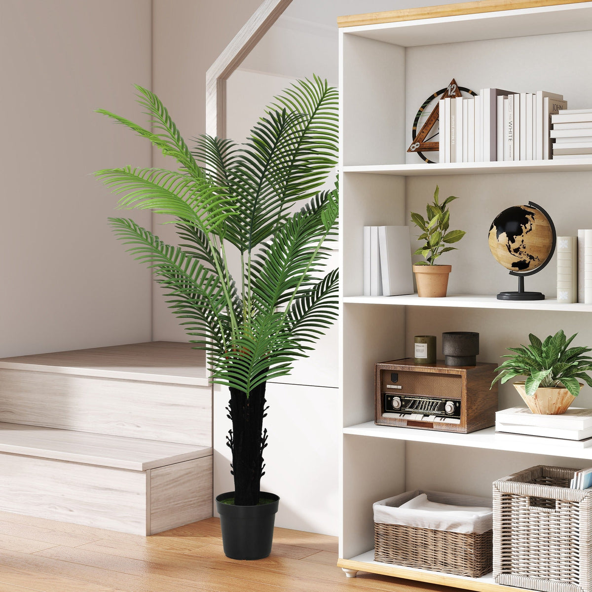 Tall artificial areca palm with lush green pe leaves and black trunk in sleek black plastic pot for home decor