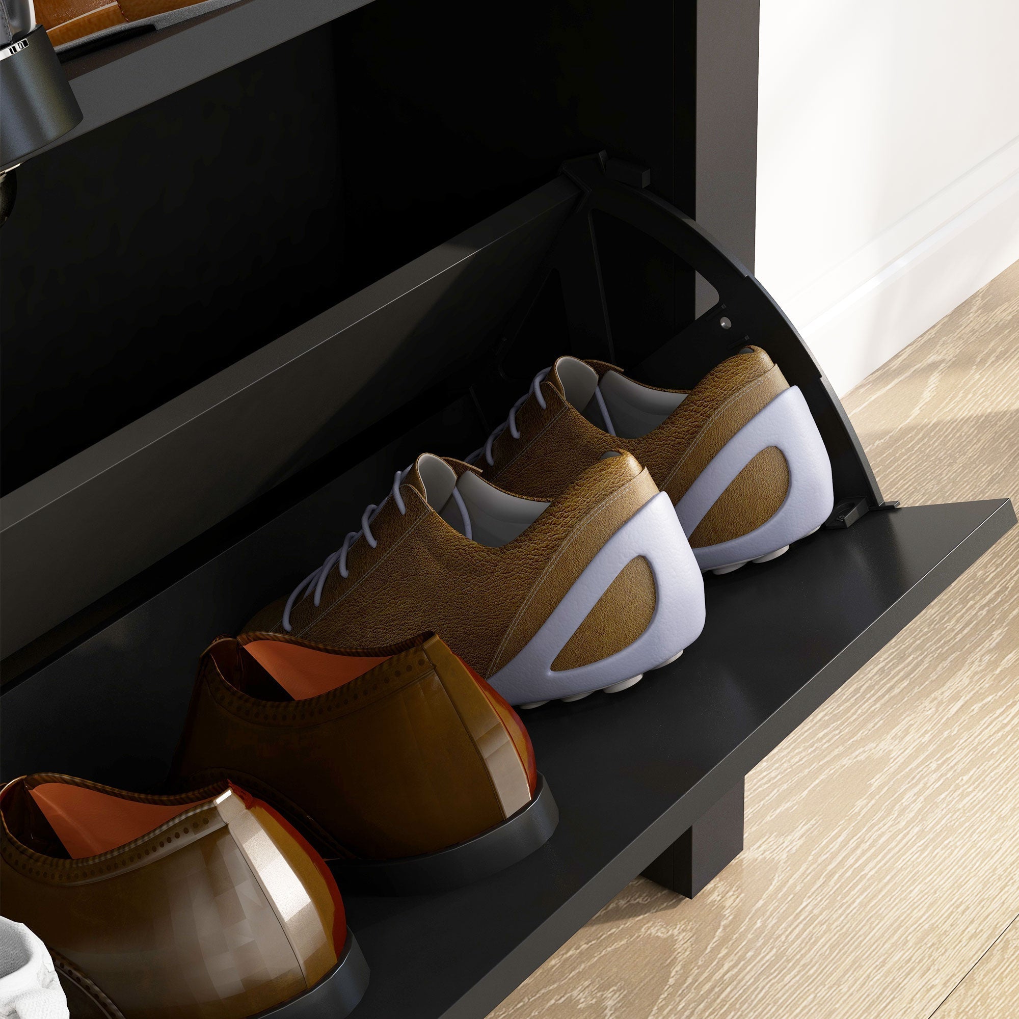 Brown leather sneakers with white soles inside a black homcom shoe cabinet with adjustable shelf and two tipping drawers