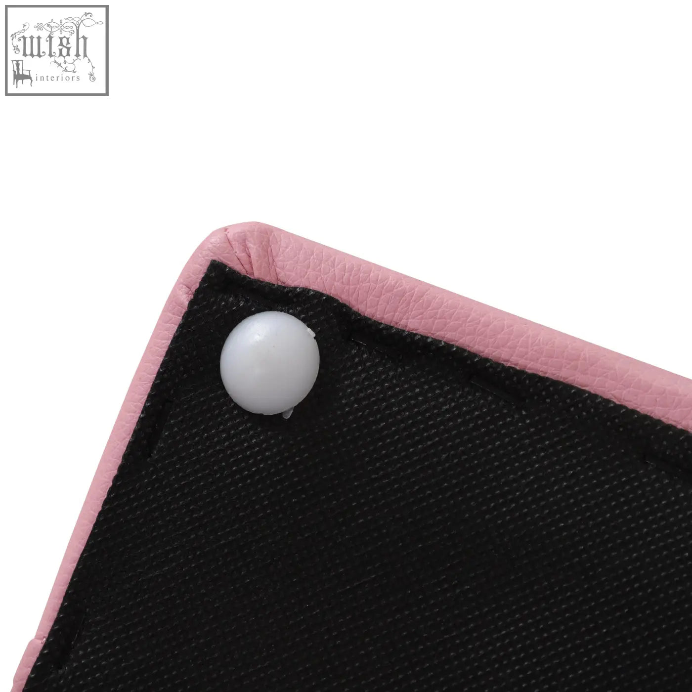Pink faux leather-trimmed black mesh toddler sofa chair with white snap button for game and playroom use