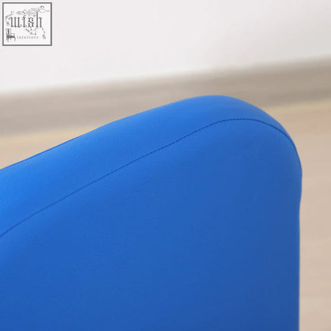 Bright blue toddler sofa chair armrest with smooth surface and neat stitching on wooden frame for playroom use